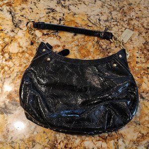 Kate Landry black leather bag with gold accents, 12"X7". zippered pouch, pre-own